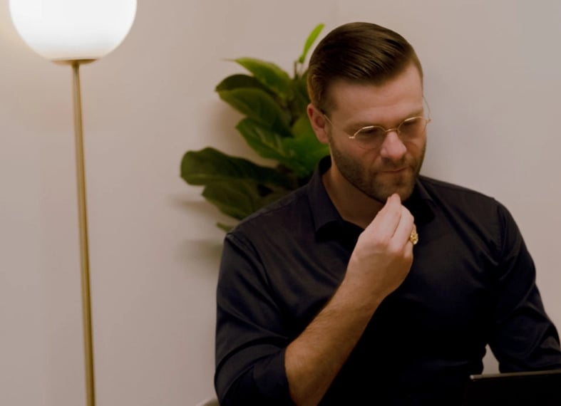 Men working on his laptop in Square office